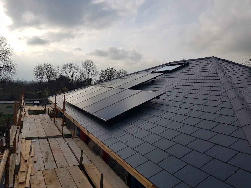 Solar panels being installed on a roof.